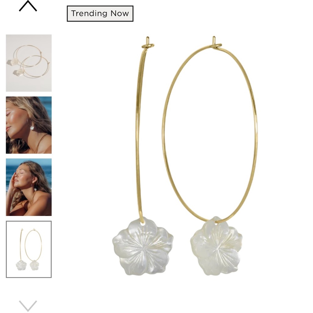 Gold Hoop Earrings with pearl hibiscus charm. James Michelle, sold out online